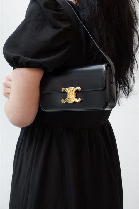 Elevate your ensemble with the unparalleled elegance of the Triomphe Shoulder Bag in Shiny Black Calfskin. Its lustrous finish and timeless design make it a coveted addition to any fashion-forward wardrobe. Turn heads wherever you go. 🖤✨ #TriompheBag #ShinyCalfskin #BlackElegance Shop our curated selection at loveholic.sg or drop us a message to enquire about our sourcing services! Triomphe Celine, Celine Triomphe Shoulder Bag, Triomphe Shoulder Bag, Shoulder Bag Outfit, Celine Shoulder Bag, Celine Triomphe, Bag Outfit, Celine Bag, Cloth Bags