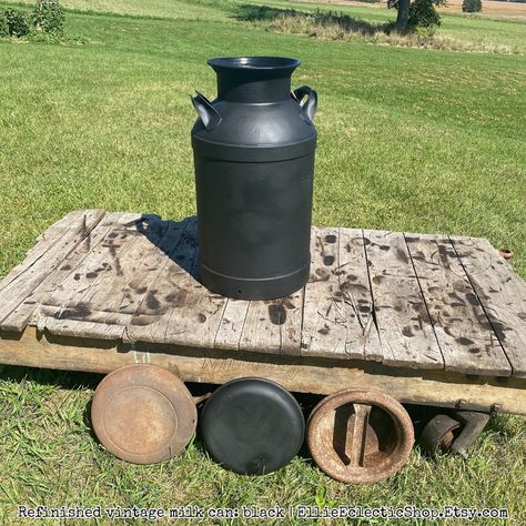 large vintage milk cans refinished black for front porch address sign garden decor or rustic home decor available at ellie eclectic shop on etsy! Outdoor Summer Decor, Metal Milk Jug, Antique Milk Can, Rustic Front Porch, Vintage Milk Can, Rustic Chic Decor, Boho Style Decor, Farmhouse Industrial, Farmhouse Decorating