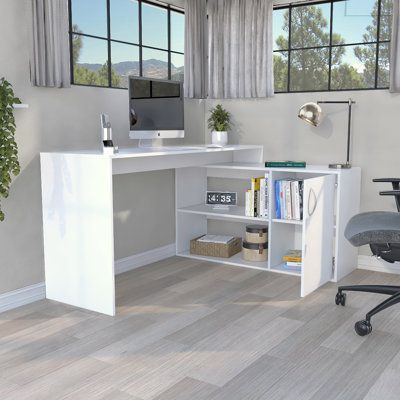 The Tuhoe axis l-shaped home office desk is just the thing you need to adapt to the modern working world! This l-shaped computer corner desk will be a stunning focal point in your contemporary home office and adapts to the new needs of working from home. This simple and stylish piece features thick panels and clean lines. It also incorporates both open shelving and a closed cupboard with two interior shelves. The writing desk offers a spacious work surface (75.1" diagonally) that is great for do Large Storage Cabinets, L Shape Desk, Contemporary Home Office, Interior Shelves, Family Tv, Home Office Furniture Desk, L Shaped Desk, White Desks, Office Desk Chair