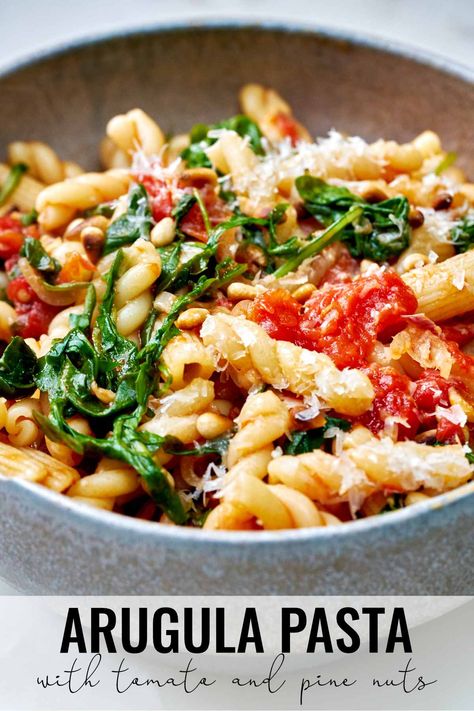 The barely cooked, peppery arugula adds a brightness to this lightly sauced tomato and arugula pasta with pine nuts. Ready in 30 minutes! #arugula #pasta #light Tomato Burrata Pasta, Cooked Arugula, Light Pasta Recipes, Burrata Pasta, Arugula Pasta, Arugula Recipes, Light Pasta, Basil Recipes, Pine Nuts