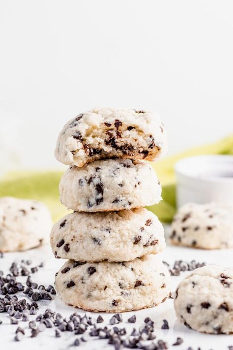 These ricotta cookies are an easy adaptation to a classic Italian recipe, including butter and baking powder for soft and creamy cookies. They’re filled with decadent chocolate chips and rolled in granulated sugar with the option of adding icing, jam, glaze, or a frosting. Italian Pepper Cookies Recipe, Ricotta Dessert Recipes, Ricotta Icing, Italian Chocolate Cookies, Pepper Cookies Recipe, Creamy Cookies, Ricotta Chocolate, Italian Ricotta Cookies, Almond Flour Chocolate Chip Cookies