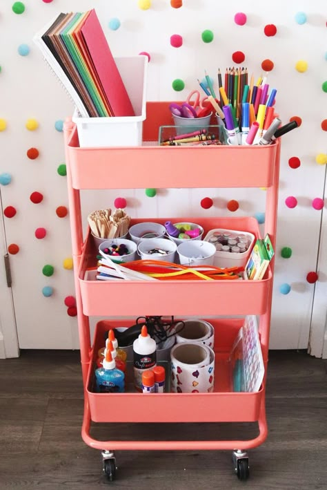 How to Make a Kids Art Cart. Use a three-tiered rolling cart and fill it with arts and craft supplies from Oriental Trading to keep kids occupied at home. Art Rolling Cart, Diy Craft Caddy, Craft Cart For Kids, Kids Art Studio At Home, Art Cart Organization For Kids, Kids Craft Cart, Rolling Art Cart, Craft Cart Ideas, Kids Art Cart