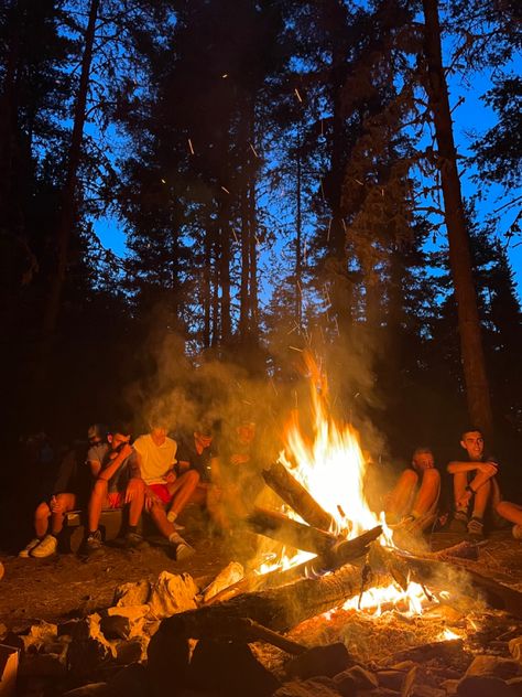 a group of people sitting by the fire on an island Slasher Summer Camp Aesthetic, 1970s Summer Aesthetic, Haunted Summer Camp, Summer Camp Slasher Aesthetic, American Camp Aesthetic, Summer Camp Vintage, Slasher Summer Camp, Vintage Summer Camp Aesthetic, 80s Summer Camp Aesthetic