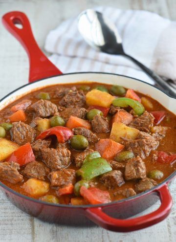 Beef Caldereta with beef cubes simmered to perfect tenderness in a spicy tomato sauce. Chockfull of potatoes, bell peppers, and green olives, this classic Filipino stew is hearty, tasty, and perfect for family dinners and special occasions. Beef Pinoy Recipe, Pork Kaldereta Recipe, Beef Caldereta Recipe, Filipino Beef Stew Recipe, Beef Kaldereta Filipino Food, Salpicao Recipe, Filipino Ulam, Kaldereta Recipe, Caldereta Recipe