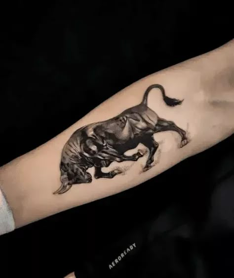 Express your inner strength with these powerful bull tattoo designs. From intricate details to bold outlines, find inspiration for your next ink. #bulltattooideas #strength #tattooinspiration Brahman Bull Tattoo, Charging Bull Tattoo, Bull Tattoo Men, Bull Tattoo Design For Men, Spanish Bull Tattoo, Spain Tattoos Ideas, Bull Tattoo Ideas, Bull Tattoo Feminine, Honey Badger Tattoo