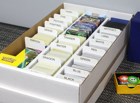 What size of card box do you need to store your card collection? BCW offers card boxes with one to five rows. Trading Cards Storage Ideas, Tcg Storage Diy, Pokemon Card Storage Diy, Pokemon Cards Organization, Organize Pokemon Cards, Organizing Pokemon Cards, How To Organize Pokemon Cards, Pokemon Card Organization Ideas, Pokemon Card Organization