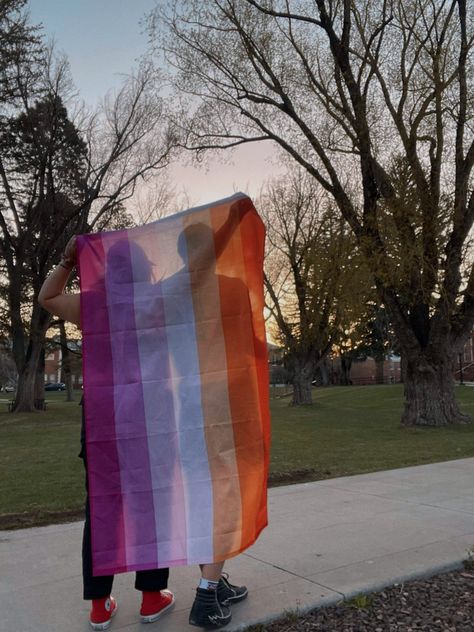 Wlw lesbian gay pride photoshoot sunset flag queer couple Pride Photoshoot, Queer Flag, Sunset Flag, Photoshoot Sunset, I Need A Girlfriend, Need A Girlfriend, Flag Pride, Lesbian Quotes, Lesbian Flag