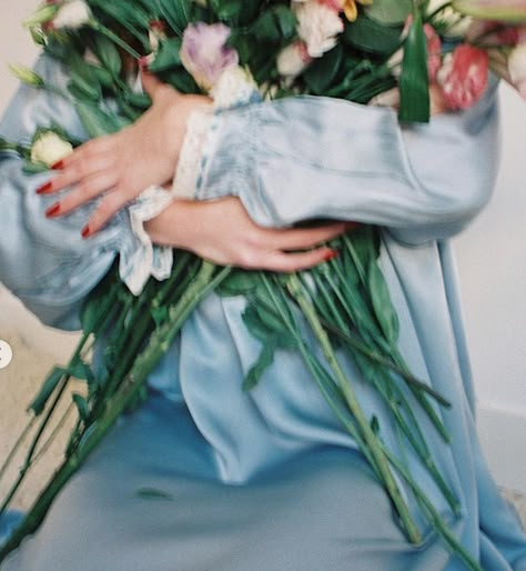 Handful Of Flowers, Fake Flower Photoshoot, Garden Film Photography, Poor Things Inspired Aesthetics, Carrying Flowers, Green Flags, Poor Things, Sopot, Lando Norris