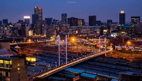 antbosman In the foreground the iconic Mandela Bridge with some Friday night traffic . The background the magical Johannesburg.#jhbskylineinyourpocket#johannesburginyourpocket Johannesburg Skyline, Night Traffic, Johannesburg City, Johannesburg South, Creative Poster, Concept Board, Creative Poster Design, Creative Posters, Johannesburg