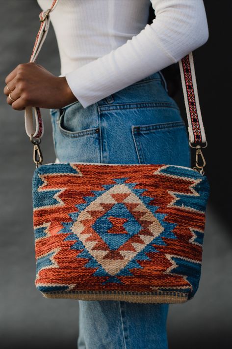 A statement crossbody bag for the upcoming season is a must! Our popular blue, rust and tan Aztec inspired print is back in a crossbody, and will guarantee compliments! Authentic Woman, Kilim Bag, Navajo Style, Boho Bags, Fall Accessories, Design Concepts, Custom Bags, Blue Bags, Bag Pattern