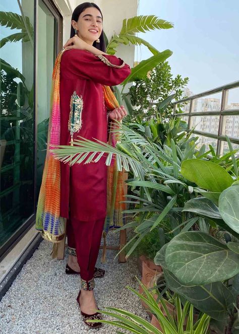 Color: Red Fabric: Kurta: Raw silk Dupatta: Chiffon Work Technique: Featuring intricate gota work Description: Our crimson pocket kurta with cuffed shalwar and multi colored chunri dupatta featuring intricate gota work from our latest Festive Collection ‘20. It is a 3 piece stitched outfit. Includes: Kurta Shalwar Dupatta Saheefa Jabbar Khattak, Pocket Kurta, Asian Wedding Dress Pakistani, Luxury Pret, Eid Outfit, Gota Work, Gaun Fashion, Pakistani Fancy Dresses, Pakistani Dresses Casual