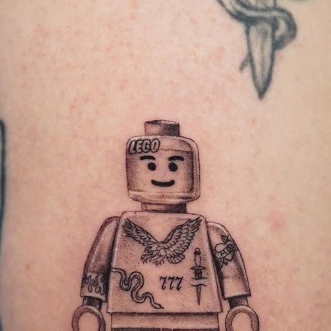 Michael Alvarez on Instagram: "@lego 🗡️
This was about 2.5 inches tall 👌🏼 Thanks Devin!

#lego #legominifigures #legotattoo #smalltattoo" Matching Lego Tattoo, Lego Skull Tattoo, Lego Tattoo Ideas For Men, Lego Man Tattoo, Starwars Lego Tattoo, Lego Tattoo Ideas, Lego Tattoo, Soldier Tattoo, Lego Toy