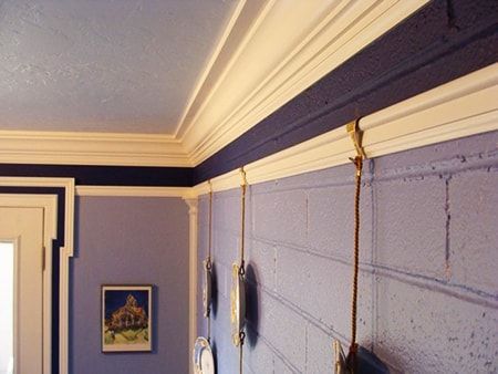 Diy Picture Rail, Picture Moulding, Picture Rail Hanging, Kitchen Brick Wall, Decorating Aesthetic, Art Hanging System, Kitchen Brick, Picture Rail Molding, Art Arrangement