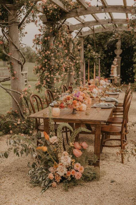 Beautiful Wooden Wedding Table with Pastel Orange and Pink Wedding Flowers and Tapered Candles Peach Color Palettes, Orange And Pink Wedding, Woodland Wedding Inspiration, Outdoor Summer Wedding, Tapered Candles, Pastel Orange, Wedding Inspiration Summer, Pink Wedding Flowers, Rock My Wedding