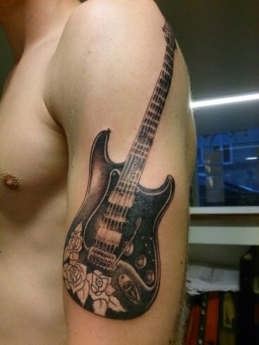 Fender Stratocaster Fender Stratocaster Tattoo, Fender Guitar Tattoo, Stratocaster Tattoo, Guitar Tattoos, Guitar Tattoo, Old School Tattoos, Fender Guitar, Music Tattoos, Tattoos Designs