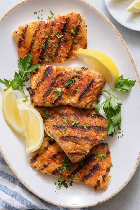 Deliciously moist grilled cod with a simple seasoning ready in just 15 minutes! Plus, helpful tips for keeping your cod from sticking to the grill! | Grilled Cod | Summer Grill Recipes | Grilling Fish | Weeknight Meal | Grilled Cod Recipes, Feel Good Foodie, Grilled Cod, Cod Fish Recipes, Grilled Fish Recipes, Frozen Fish, Fish Dinner Recipes, Air Fryer Fish, Healthy Grilling Recipes