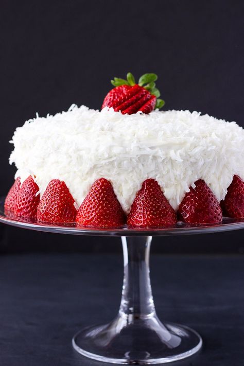 Strawberry Coconut Cake - moist, heavenly cake with a creamy coconut frosting, topped with fresh strawberries and a strawberry sauce! Perfect for any occasion! Strawberry Coconut Cake, Coconut Cream Cheese Frosting, Cake With Coconut, Cake Recipes At Home, Coconut Cake Recipe, Cake Frosting Recipe, Coconut Frosting, Cake Fork, Zucchini Cake