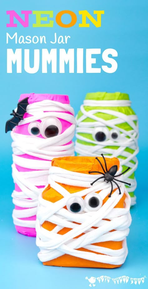 MASON JAR MUMMIES - This Halloween make spooky Neon Mason Jar Mummies. These colourful mummies look great day and night! Fill them with candy for Halloween treats or tea lights for Mummy Luminaries. Halloween Luminaries, Mummy Crafts, Halloween Crafts Preschool, Kids Craft Room, Fun Halloween Crafts, Halloween Arts And Crafts, Easy Halloween Crafts, Halloween Activities For Kids, Halloween Crafts For Kids