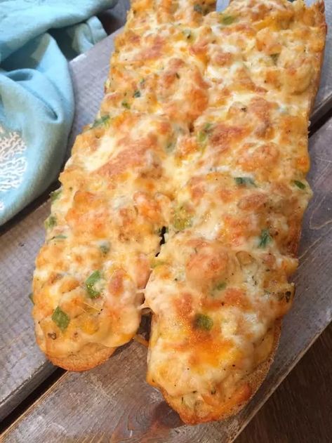 Shrimp + Bread + Cheese! Need I say more? My cousin and her hubby shared this loaf of delicious-ness with us at the beach one year and it was an instant favorite. You can add a salad, and make a meal of it. Or you can slice it and serve as an appetizer. The best part? You can make it using your leftover shrimp. Yep, a brand new meal with leftovers. Winner winner, shrimp dinner. First, rough chop your shrimp. With this batch we had tossed the shrimp in olive oil, salt, pepper and p… Shrimp Melt, Shrimp Bread, Leftover Shrimp, French Bread Loaf, Shrimp Toast, Stuffed Bread, Breaded Shrimp, Shrimp Appetizers, Bread Cheese