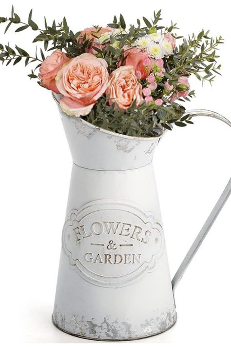 Farmhouse Decor: The color of this metal pitcher vase is more an off white and simulate old-style design, the shape of each scar are designed, it contains the memory of time. Bring a feel of rustic/shabby chic style, it perfect for farmhouse/country/vintage decor.
Vase for Flowers: The elegant white vase is suitable for any dried flower and artificial flowers decoration. Shabby Chic Vase, Metal Milk Jug, Milk Jug Vase, Shabby Chic Vases, Jug Vase, Rustic Shabby Chic, Metal Vase, Jar Vase, Unique Vases