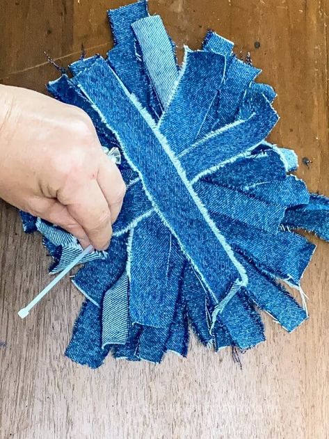 Add a little denim and diamonds to your home decor with this messy bow DIY. This adorable bow can be added to banners and wreaths, or even attached to a vase for a little whimsy. So gather some old jeans and let's get crafting! #southerncrushathome #denimmessybowdiy #diymessybow Jean Crafts Ideas Simple, Shabby Flowers Diy How To Make, Jean Flowers Diy, How To Make Denim Flowers, Denim Bows Diy, Denim Flowers Diy Tutorials, Denim Jewelry Diy How To Make, Messy Bows Diy, Denim Flowers Diy How To Make