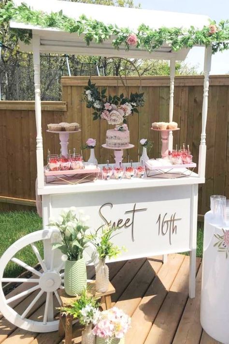 Feast your eyes on this beautiful floral sweet 16! The dessert table cart is fab!! See more party ideas and share yours at CatchMyParty.com #catchmyparty #partyideas #sweet16 #sweetsixteen #floralparty #girlbirthdayparty Sweet 16 In Backyard, Sweet 16 Yard Decorations, Sweet 16 Party Centerpieces, Rustic Sweet 16 Party Ideas Decoration, Sweet 16 Outdoor Decorations, Whimsical Sweet 16 Party Ideas, Sweet 16 Decorations Outdoor, Dessert Table Sweet 16, Sweet Sixteen Backyard Party Ideas