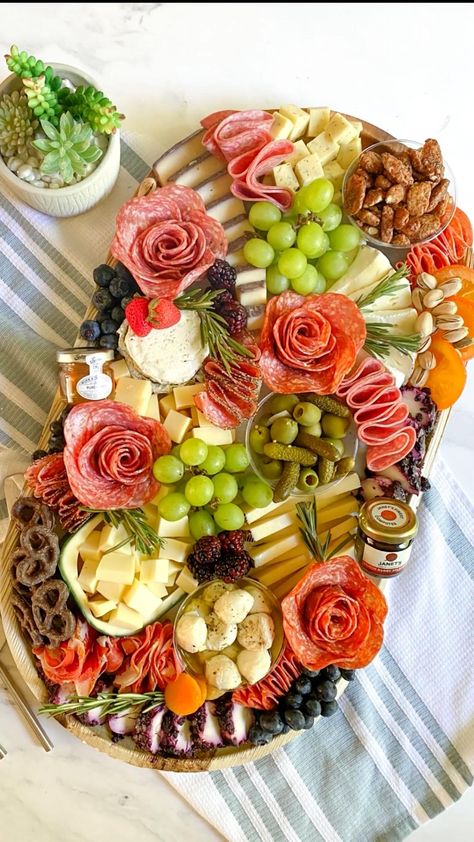 these charcuterie boards are to die for! | charcuterie | we can't get over these gorgeous charcuterie boards! (https://www.instagram.com/saratogagrazingco/) | By Tasty Meat Cheese Platters, Charcuterie Board Meats, Charcuterie Appetizers, Upbeat Music, Soft Music, Charcuterie Spread, Organic Meat, Party Food Buffet, Catering Ideas Food