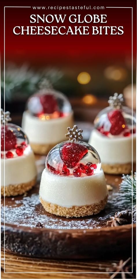 These adorable Snow Globe Cheesecake Bites are a festive treat that combines a creamy cheesecake filling with a crunchy cookie crust and a charming snow globe topper. A small fondant snowman enclosed within a clear gelatin dome creates the perfect winter wonderland effect. Ideal for holiday parties or as a sweet surprise for family gatherings. Clear Gelatin Recipe, Christmas Cheesecake Bites, Small Cheesecake Recipe, Snowman Recipes, Christmas Cheesecake Recipes, Globe Cake, Small Cheesecakes, Mint Desserts, Christmas Cheesecake