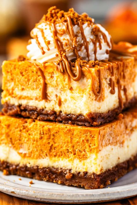 These Pumpkin Cheesecake Bars feature a Biscoff cookie crust, a creamy pumpkin swirl cheesecake filling. They are rich and delicious. Pumpkin Cheesecake Bars Recipe, Pies And Tacos, Pumpkin Swirl Cheesecake, Pumpkin Cheesecake Bars, Biscoff Cookie Butter, Fall Baking Recipes, Cheesecake Bar Recipes, Vegan Cupcakes, Macaron Recipe