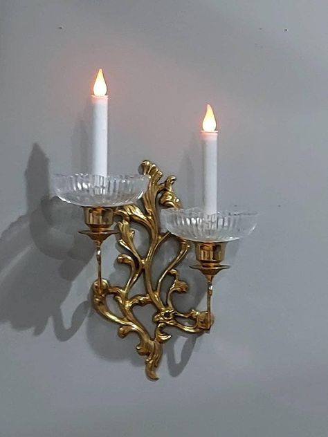 "This ornate brass double wall sconce is absolutely beautiful! It is large and heavy. It is 14 inches long, 9.5\" wide, 8\" deep, and weighs over 3 lbs. The gorgeous bobeche candle holder cups are large and heavy as well. They are 6\" wide, 2\" tall, and weigh 2 lbs. They have sparkling ribbed glass with scalloped tops. They are in great condition.  No chips or cracks. This vintage style and quality is hard to find. The daul sconce is pictured with battery-operated candlesticks and tealights. No Modern Witch Decor, Vintage Wall Candle Holders, Sconces Candle, Antique Wall Candle Holders, Diy Wall Sconces, Vintage Candle Sconces, Victorian Candle Sconces, Candle Holder Wall, Real Candles