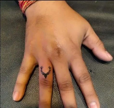 12+ Best Deer Finger Tattoo Designs - PetPress Stag Hand Tattoo, Fox Finger Tattoo, Deer Finger Tattoo, Antler Finger Tattoo, Western Finger Tattoos, Married Couple Tattoos, Small Deer, Tattoo Wedding Rings, Finger Tattoo Designs