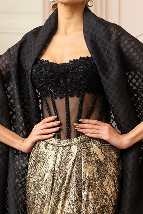 Buy Tarun Tahiliani Black Foil Jersey Balloon Cape And Draped Skirt Set Online | Aza Fashions Wedding Lehenga Designs, Corset Blouse, Traditional Indian Outfits, Bridal Dress Fashion, Tarun Tahiliani, Stylish Blouse Design, Draped Skirt, Trendy Blouse Designs, Fancy Blouses