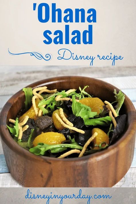 'Ohana salad recipe - Have you tried the salad at Ohana? With a passion fruit, orange juice, and guava dressing, this one is perfect for summer and now you can make it at home! Disney in your Day #disneyrecipes #disneyfood #ohana #saladsatdisney #disneysalad #ohanarecipe #ohanasalad #disneyathome #disneyinyourday Ohana Copycat Recipes, Disney Salad Recipes, Ohana Noodles, Ohana Restaurant Disney Recipes, Ohana Character Breakfast, Finding Ohana Movie, Pog Juice, Tropical Salad, Honey Lime Dressing