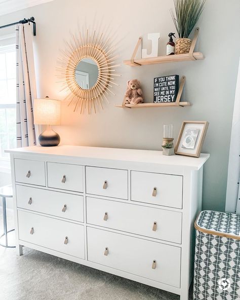 Ikea Hemnes dresser in Nursery with leather pulls by One Dream Two Sisters on Instagram Toddler Dresser With Mirror, Nursery Floating Shelves Over Dresser, Nursery Shelves And Mirror, Ikea Dresser With Mirror, Dresser And Floating Shelves, Ikea Baby Dresser, Floating Shelves Over Dresser, Floating Shelf Above Dresser, Floating Shelves For Nursery