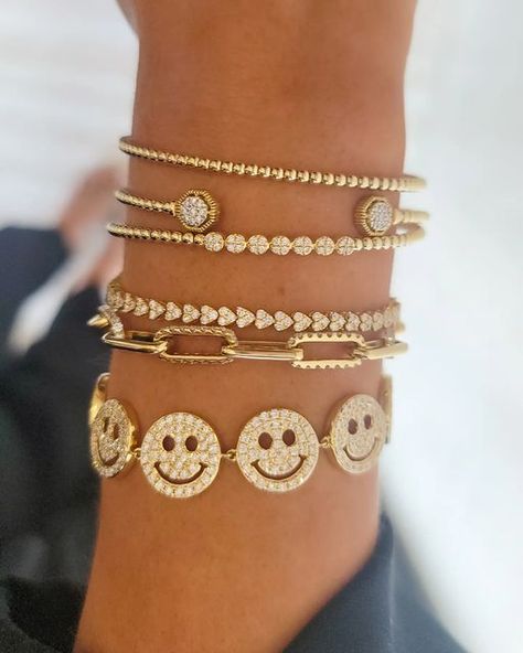 Mariloff Diamonds & Jewelry on Instagram: "What could make you happier than this wrist stack? 😀 DETAILS, top to bottom: 📿Gold bead Bangle 💛Bujukan Cuff Bracelet with Diamond Pavé Hexagon Caps 💎Bujukan Cluster Diamond Bangle 🤍Dainty Heart Diamond Tennis Bracelet 🔗Diamond Link Chain Bracelet 😀Diamond Smiley Face Bracelet DM, call, or text us for more details! (214) 744-2490" Smiley Bracelet, Smiley Face Bracelet, Wrist Stack, Wrist Stacks, Bracelet Diamond, Diamonds Jewelry, Link Chain Bracelet, Diamond Tennis Bracelet, Heart Diamond