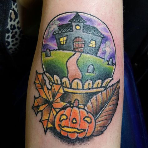 Cute Halloween tattoo I got recently.  #tattoo #halloween #traditionaltattoo #ghost #pumpkins #colorfultattoos #fall Snow Globe Tattoo, Dark Realism, Globe Tattoo, Halloween Tattoo Flash, Cute Halloween Tattoos, Tattoo Halloween, Globe Tattoos, Autumn Tattoo, Scary Tattoos