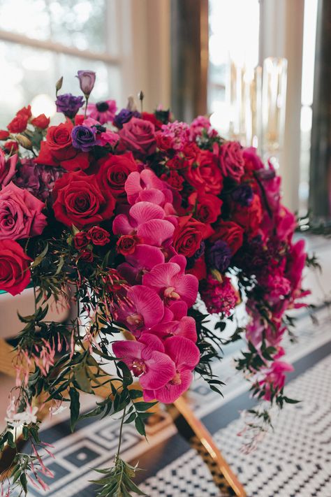 sweetheart table, sweetheart table flowers, fuchsiaflowers, bright wedding decor, orchid wedding flowers, wedding centerpiece, wedding flowers, pink and purple flowers, pink and red flowers #luxurywedding #everlieco #weddingcenterpiece #sweethearttable #weddingflowers Fuschia Flowers Wedding, Magenta Floral Arrangements, Deep Pink Wedding Flowers, Fuschia Centerpieces, Fuschia Wedding Decorations, Fuschia Wedding Flowers, Deep Pink Wedding, Wedding Palette Spring, Bright Wedding Decor