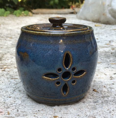 Garlic pot by Keramos Pottery and Ceramics Studio Nicosia Cyprus Garlic Pottery Pot, Garlic Holder Pottery, Hollow Ceramic Ideas, Ceramics Lidded Jar, Ceramic Jar Ideas, Lidded Jars Ceramic Pottery Ideas, Pierced Pottery, Ceramic Jars With Lids, Clay Pot With Lid