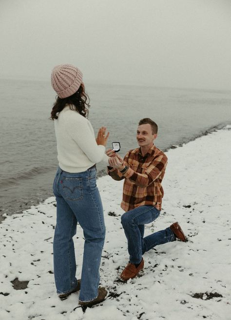 Winter proposal on the beach in Alaska Proposal Outfits For Her Winter, Proposal Pictures Winter, Fall Beach Proposal, Winter Outdoor Proposal Ideas, Proposal In The Snow, Winter Beach Proposal, Snow Proposal, Outdoor Proposal, Winter Proposal