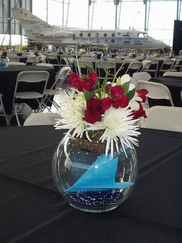 An airplane in the centerpiece- maybe see if we can pay Brandi to make some specific planes with her cricut to go inside? Aviation Wedding Theme, Aviation Party, Hangar Wedding, Airplane Wedding, Aviation Wedding, Patriotic Wedding, 1940s Wedding, Aviation Theme, Aviation Decor