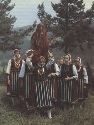 St Enyo's bride  At midsummer (24th June), a small girl dressed as St Enyo's (St John's) bride is carried around the village to bring fertility to the land, to increase the healing power of herbs and to predict the future. Fertility Ritual, Bulgarian Aesthetic, Bulgarian Folklore Art, Serbian Folklore Dance, Slavik The Dancer, Serbian Folklore Folk Costume, Bulgarian Dance Folklore, Bulgarian Culture, Polish Culture