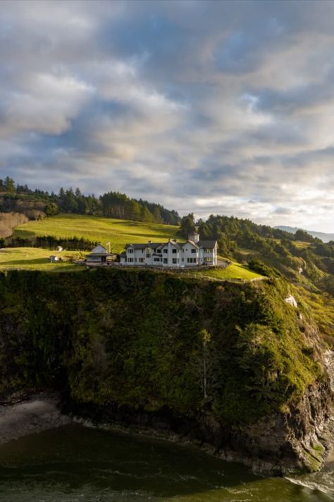 A cliffside house in coastal Oregon with a lighthouse-like tower overlooking the Pacific Ocean is headed to the market for $10 million.   The dramatic property, named Nestucca Sea Ranch, spans 25-plus acres where the Pacific Ocean meets the Nestucca River in Cloverdale, about two hours southwest of Portland. It’s expected to hit the market this week, but if it doesn’t snag a buyer quickly, an online no-reserve auction is also scheduled for next month. Cliffside Mansion, Cliffside House, Coastal Oregon, Family Compound, Sea Ranch, Lookout Tower, Cat Ideas, Boat House, 10 Million