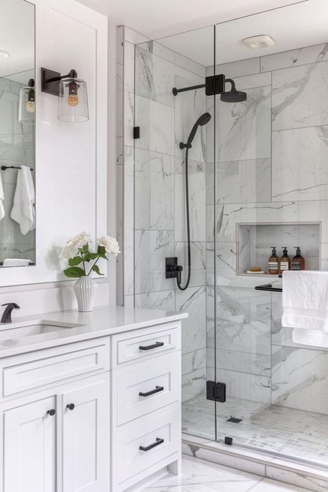 Sleek and sophisticated, modern bathrooms combine clean lines, contemporary fixtures, and a monochrome palette. See more here. Contemporary Master Bath, Terrazzo Countertop, Master Bath Ideas, Black Modern Bathroom, Navy Blue Tile, Concrete Vanity, Monochrome Bathroom, Modern Bathroom Ideas, Floating Sink