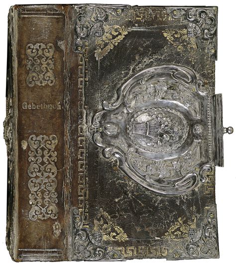 metal and leather book cover