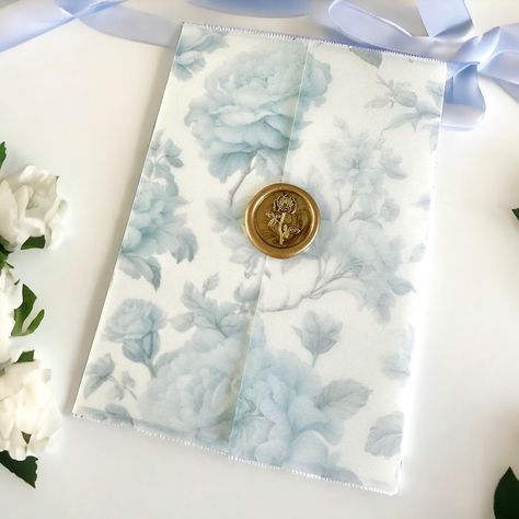 Introducing our Pre-folded Vellum Jackets: a touch of botanical elegance and luxury for your invitations. Crafted with premium vellum paper and delicate botanical designs, it adds sophistication and charm to your luxury event stationery. Wax seal stickers are sold SEPARATELY. Not sure if you want to make the commitment to investing in the vellum jackets prior to seeing them in person? No worries! Select "Sample" in the dropdown so that you can touch/feel and test it out first! Samples are also a White And Blue Wedding Invitations, Light Blue Wedding Invitations, Save The Date Wedding Invitations, Wedding Invitation Blue, Floral Vellum, Blue Save The Date, Vellum Jacket, Event Stationery, Vellum Wrap