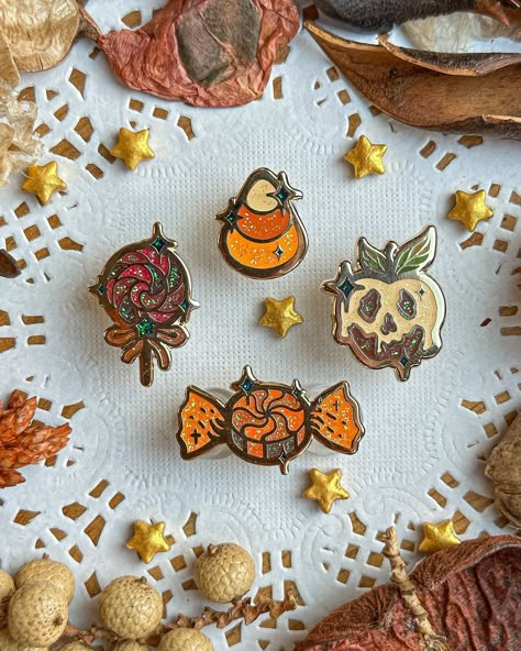 This set of colorful spooky candies, is perfect to fill tiny spaces on pin boards or to be applied to your bag, your coat or other accessories.  These mini candies will look delicious on everything and everywhere . The listing is for a set of 4 mini pins. The Pins feature: * Hard Enamel. * Gold plating. * One rubber clutch. * Glitter details.  * My logo on the back. * the pins range between 1 cm up to 2 cm. * A backing card is included in the purchase The full collection option includes:  * Six Spooky Candy, Pin Boards, Halloween Pins, Cute Patches, Pretty Pins, Enamel Lapel Pin, Cool Pins, Hard Enamel Pin, Cute Pins