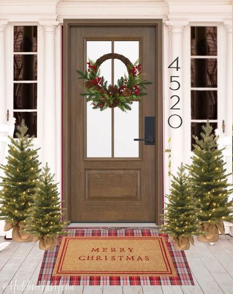 Cute Christmas front porch decor with pre-lit Christmas trees, a layered 'Merry Christmas' doormat, and a holiday wreath! Cute Front Porch Ideas, Cute Front Porch, Holiday Front Door Decor, Christmas Front Porch Decor, Front Porch Mat, Holiday Front Door, Porch Mat, Porch Doors, Christmas Doormat