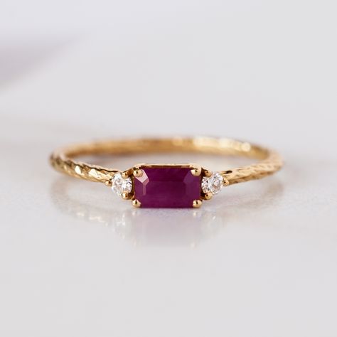 18 carat gold trilogy birthstone ring with a ruby centre stone flanked by two white diamonds. Ruby Ring Simple, Wardrobe Corner, Ruby Birthstone Ring, Ruby Ring Designs, Diamond Birthstone Ring, Cute Promise Rings, Red Gems, Born In July, July Birthstone Ring