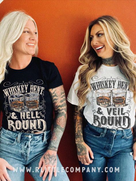 Are you ready to take your love for whiskey and country music to the next level? Look no further than our Whiskey Bent Hell Bound Tee and matching bride Tee! These are the perfect way to show off your wild & free spirit while staying true to your southern roots. If you're planning a bachelorette party, our tees are a must-have for any whiskey-loving bride-to-be and her Bach party. With their vintage-inspired design and classic country feel, you'll feel like you're living in a honky-tonk dream. Bachelorette Party Tshirts, Bride Tee, Bride Party, Artist Shirts, Western Graphic Tees, Honky Tonk, Wild Free, Bach Party, Bachelorette Shirts