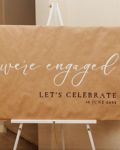 Brown Paper Engagement Banner, Engagement Party Brown Paper Sign, Surprise Engagement Party Ideas Decor, After Proposal Party, Small Engagement Party Ideas Simple, Engagement Party Entrance, Engagement Party Photo Backdrop, Simple Engagement Party Ideas, Party Entrance Sign